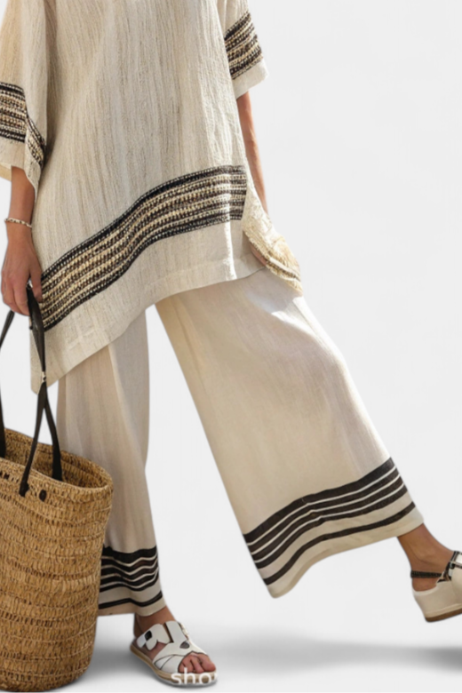 Mariella — Elegant Top with Black Stripes and Flowing Trousers