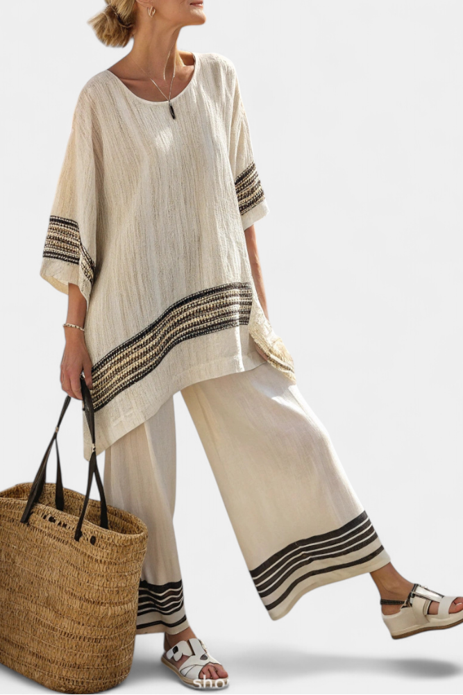 Mariella — Elegant Top with Black Stripes and Flowing Trousers