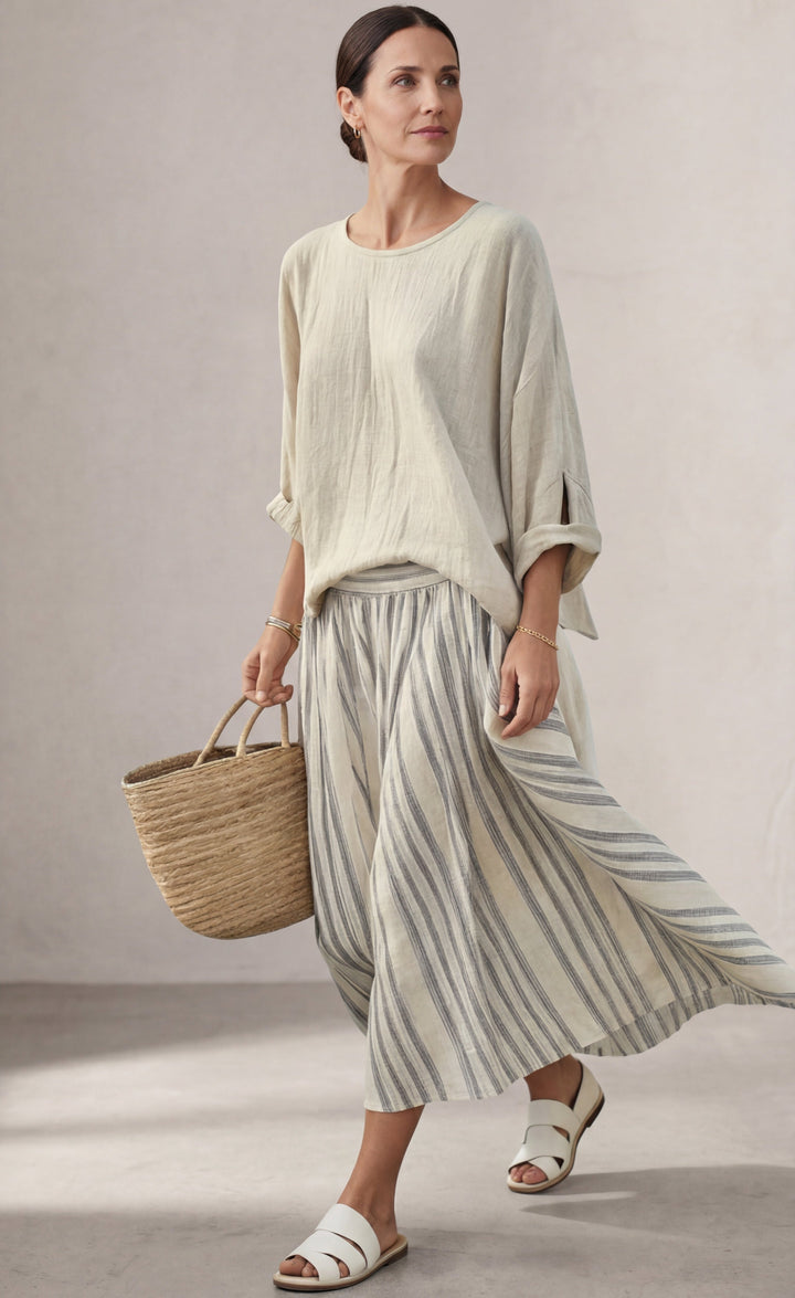 Aurora — Comfortable Blouse and Striped Midi Skirt