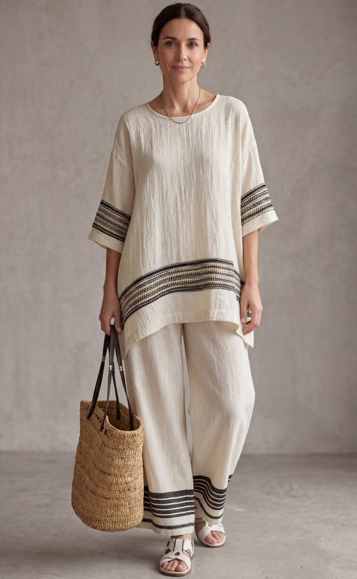 Mariella — Elegant Top with Black Stripes and Flowing Trousers